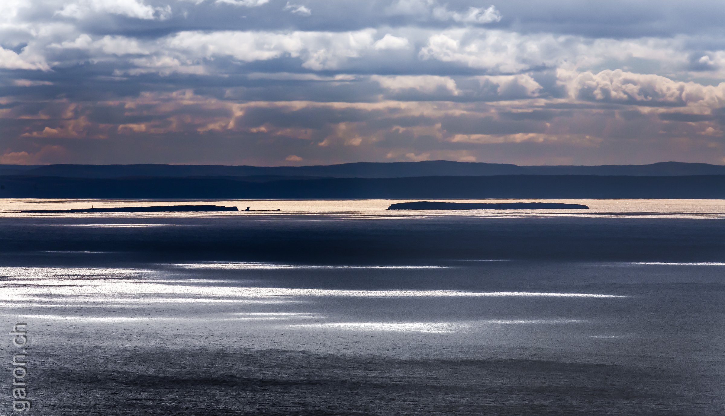 Nova Scotia, Islands in back light Along the Cabot Trail on Cape Breton Island